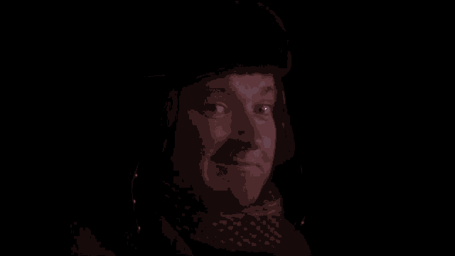 a man wearing a fur hat and scarf says bingo