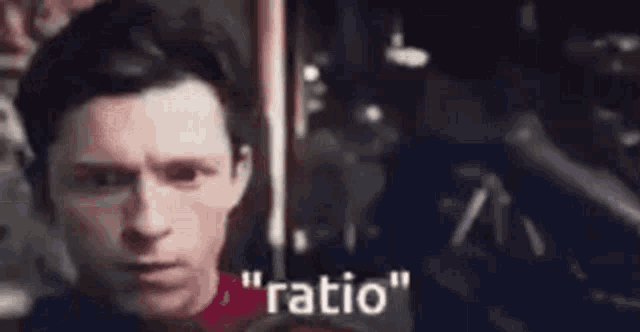 a close up of a man 's face with the words `` ratio '' written in the corner .