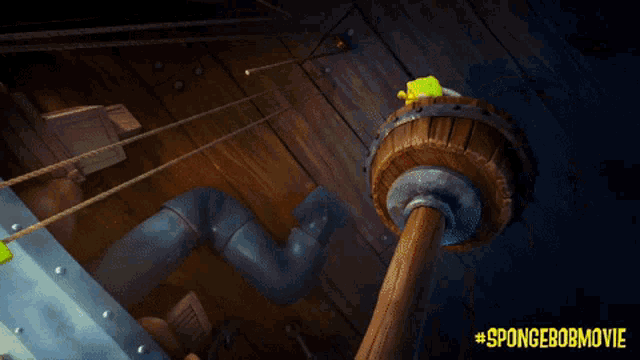 a poster for the spongebob movie shows spongebob hanging from ropes