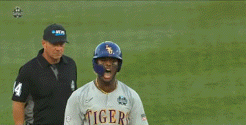 a baseball player wearing a jersey that says tigers