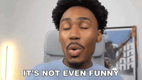 a man with his eyes closed is making a funny face and saying it 's not even funny