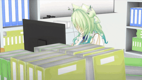 a girl with green hair is sitting in front of a computer monitor