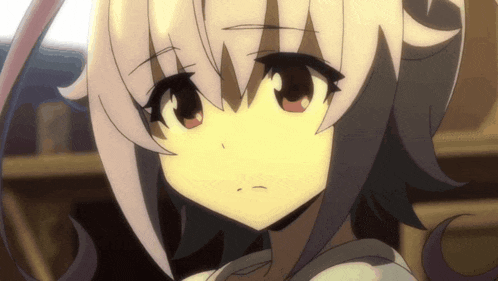 a close up of a girl 's face with white hair