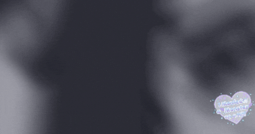 a blurred image of a person 's face with a heart that says " i 'm a little girl " on it