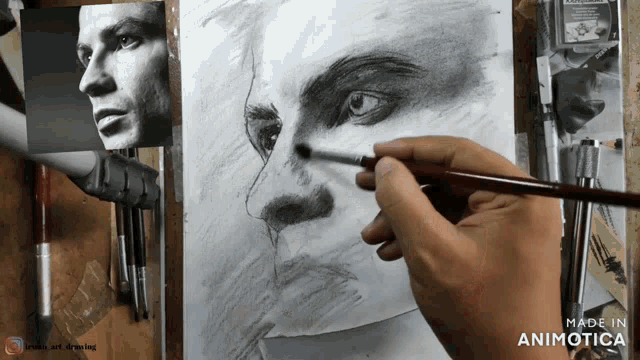 a drawing of a man 's face is being made in animotoca