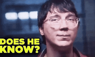 a man with glasses is asking does he know .
