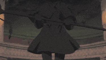 a girl in a black dress is holding a sword
