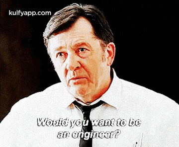 a man in a white shirt and tie is asking would you want to be an engineer