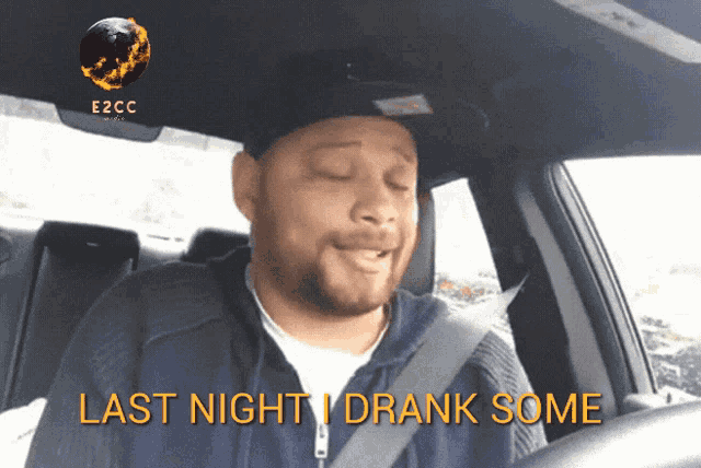a man in a car with the words last night drank some on the bottom