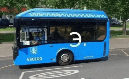 a blue bus with the number 430100 on the side of it