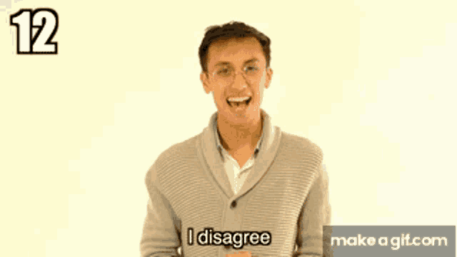 a man in a sweater says i disagree in front of a white background