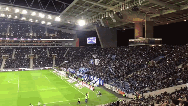 a soccer field with a banner on the side that says ' 1995 '