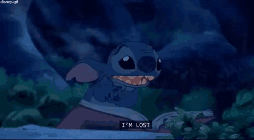 stitch from disney 's lilo and stitch is sitting in the dark reading a book and saying `` i 'm lost ''