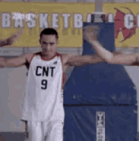 a basketball player wearing a cnt 9 jersey