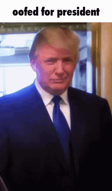 a man in a suit and tie with the words oofed for president above him
