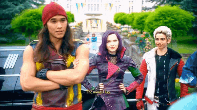 a group of descendants characters are standing in front of a limousine .