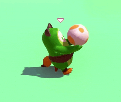 a cartoon character is holding a pink and orange ball with a heart above it .