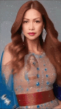 a woman with red hair and a picture of a woman on her chest