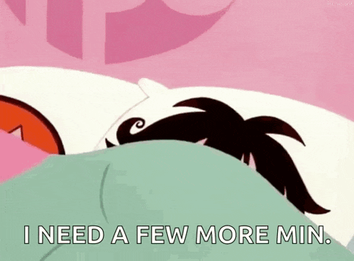 a cartoon character is laying in a bed with the words `` i need a few more min . ''