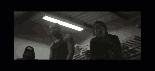 a man wearing a black hoodie with the word glock on it