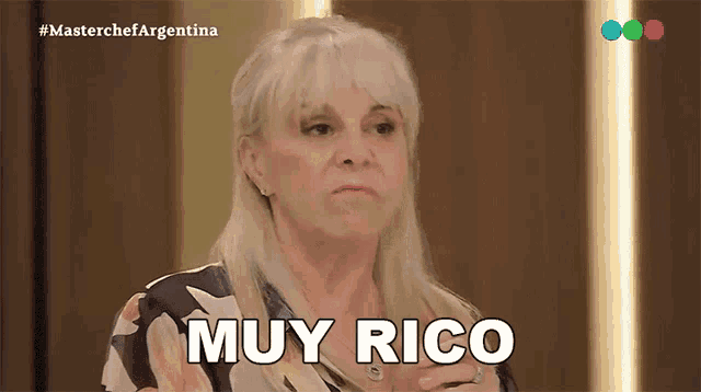 a woman says muy rico on a tv screen