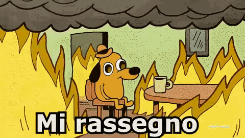 a cartoon dog is sitting at a table with a cup of coffee in front of a fire with the words mi rassegno written below him