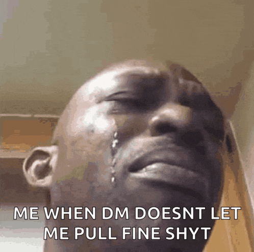 a man is crying with a tear coming out of his eye and says me when dm