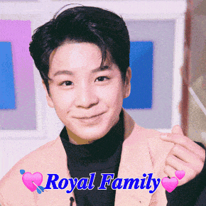a boy in a pink jacket with the words royal family written above him