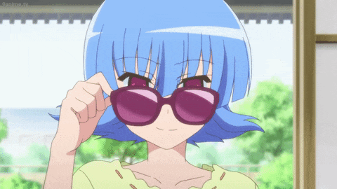 a girl with blue hair is wearing purple sunglasses