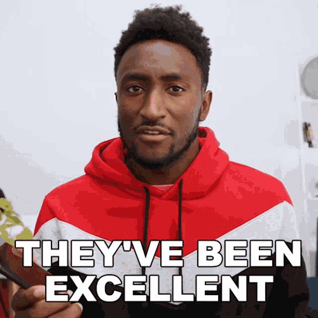 a man in a red hoodie says they ve been excellent
