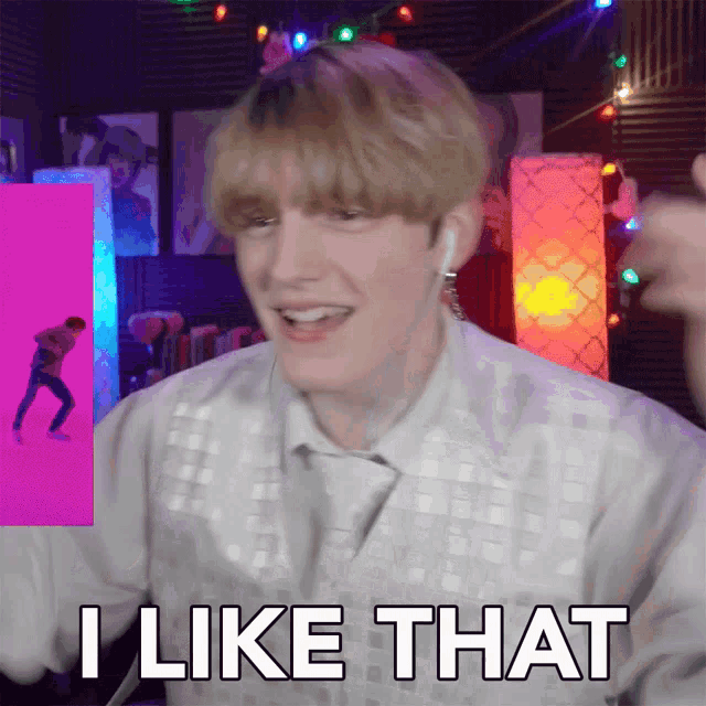 a man says " i like that " in front of a purple background