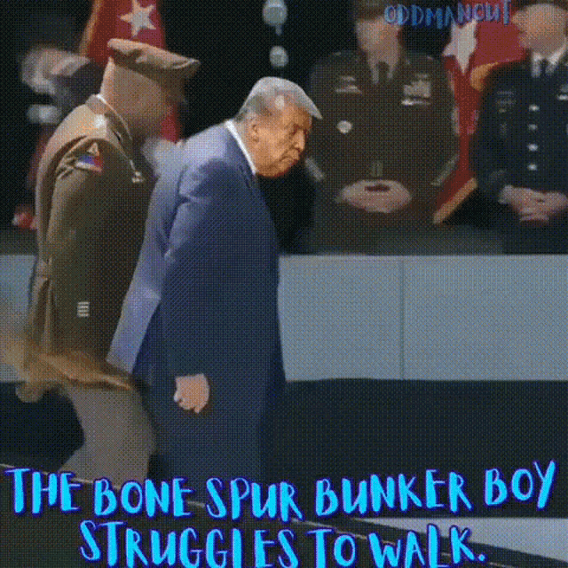 a man in a suit and tie is walking next to a soldier .