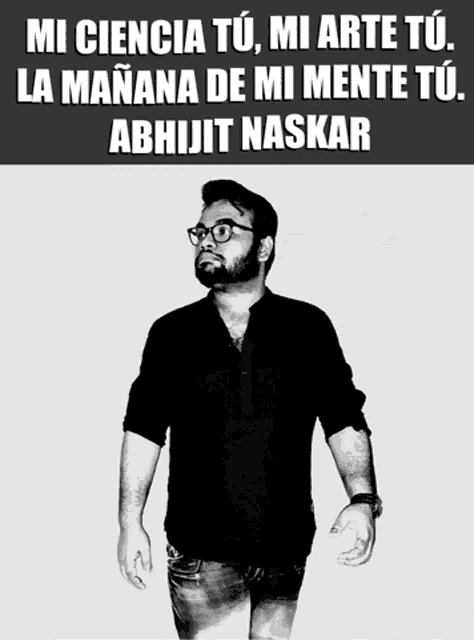 a black and white photo of a man with a beard and glasses