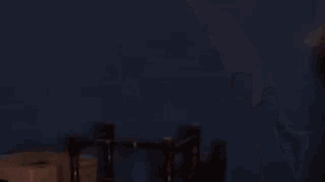 a blurry image of a man 's face with a blue background