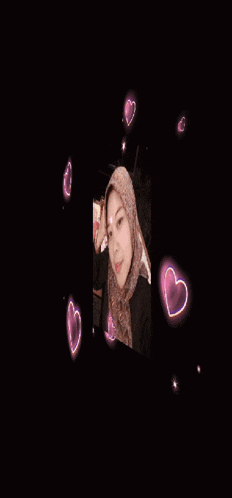 a woman wearing a hijab is surrounded by hearts and the name ani