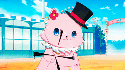 a pink cat with a top hat and a flower on its head