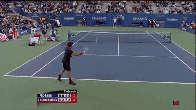 a tennis match between federer and soderling is being broadcast on tv