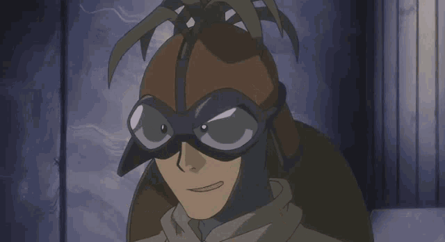 a man wearing a mask and goggles is standing next to a woman