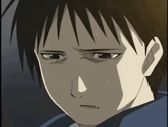 a close up of a cartoon character 's face with a sad expression .