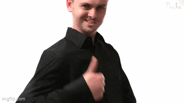 a man in a black shirt giving a thumbs up