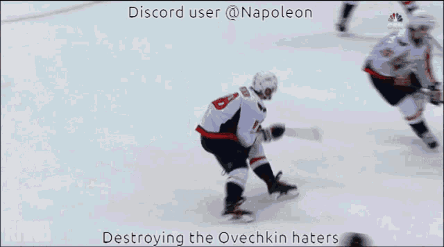 a hockey player with the number 9 on his jersey stands on the ice