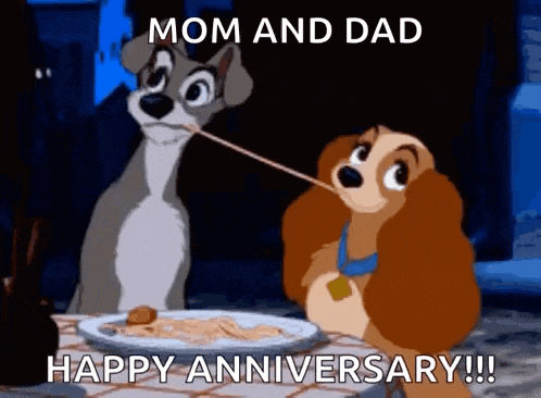 a couple of cartoon dogs sitting at a table with a plate of spaghetti .