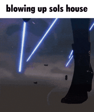 a picture of a person blowing up a house with blue lights behind them