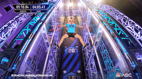 a person on a roller coaster with the number 20 on the side