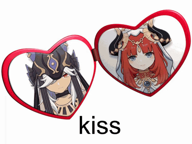 a couple of heart shaped mirrors with the word kiss below them