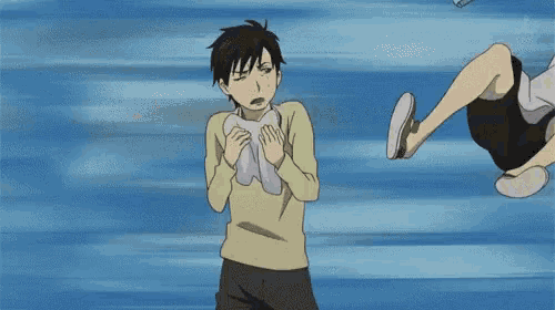 a man with a tail is being kicked in the air by another man