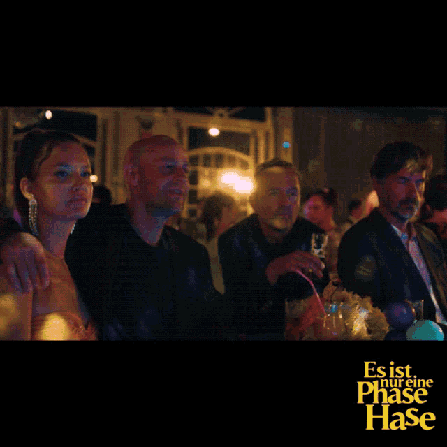 a movie poster for es ist nur eine phase hase features a group of people