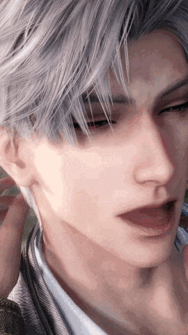 a close up of a man 's face with gray hair and a white shirt .