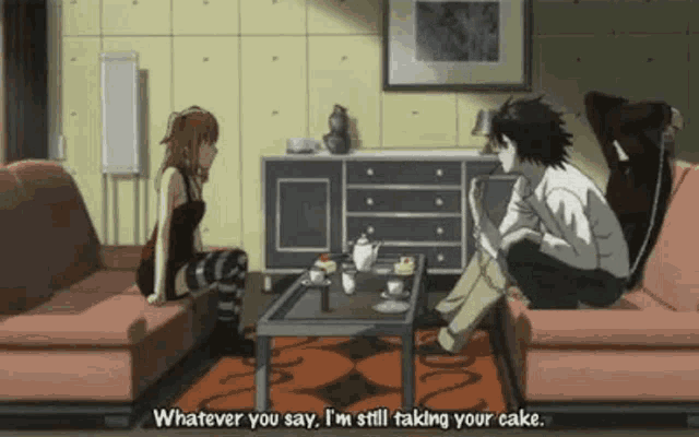 a man and a woman are sitting on a couch and talking to each other .
