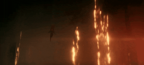 a shark is swimming in a dark room with fire coming out of the walls